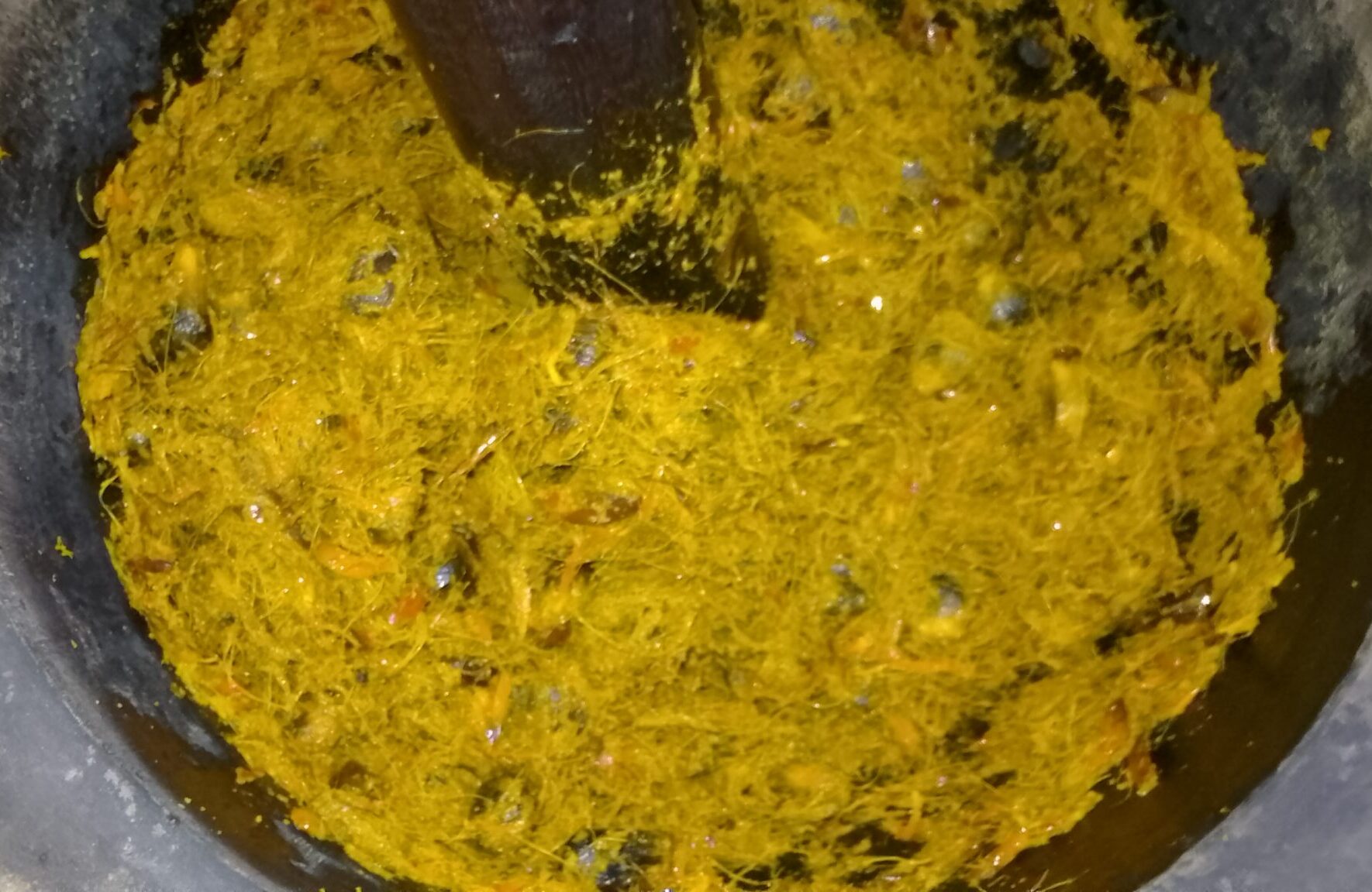 pounded-palm-fruits-or-mkpuruakwu-in-the -mortar